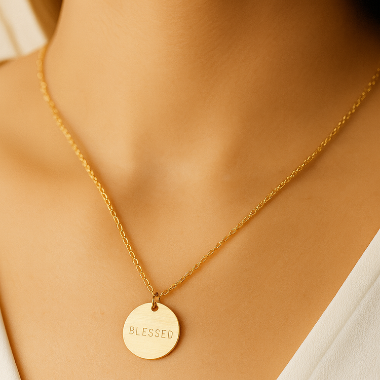 Gold necklace with round BLESSED pendant on chain