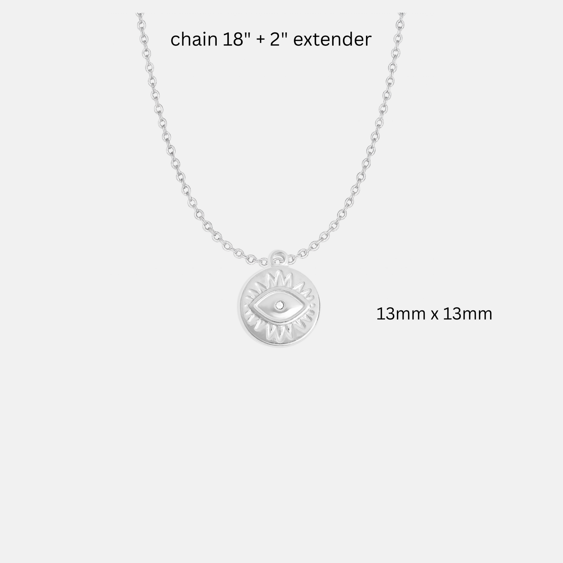 Silver necklace with an evil eye pendant with dimensions on a white background